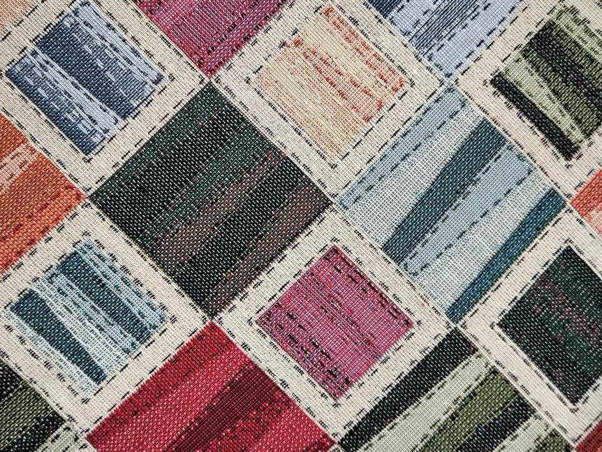 Dettaglio del tessuto del cuscino, primo piano sulla trama-tessuto multicolor