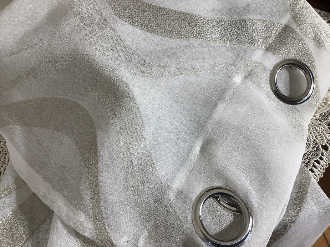 Voilage à oeillets - 1 panneau blanc/taupe - tissu fil coupé - largeur maxi 200 cm hauteur de 180 à 280 cm - rideaux salon chambre.