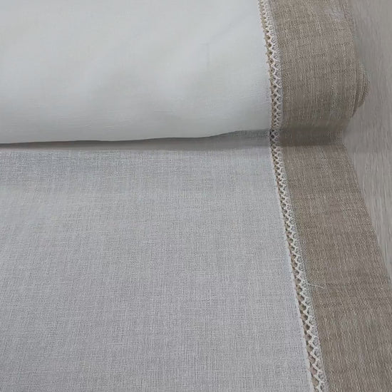 Video panoramico del tessuto effetto lino bianco naturale con bordo corda e crochetta