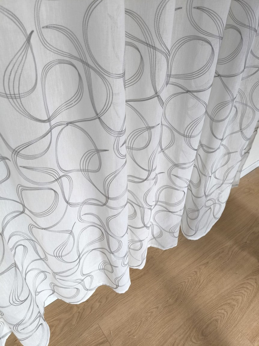 Tessuto effetto lino con ricamo grigio